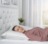 women back sleeping on bed with pillow